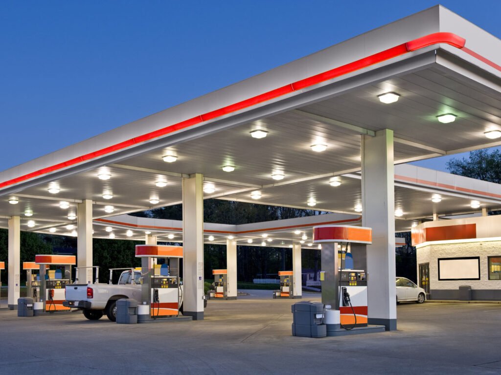 gas station pumps with light on
